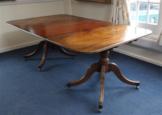 A Regency mahogany extending dining table, Extends to 8ft 8in. x 4ft H.2ft 5in.